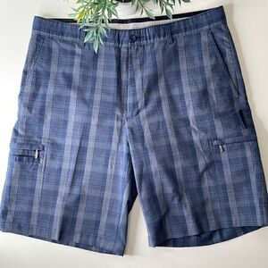 Greg Norman utility Golf Shorts. Size 37 waist.  No slip waist Zipper pockets.